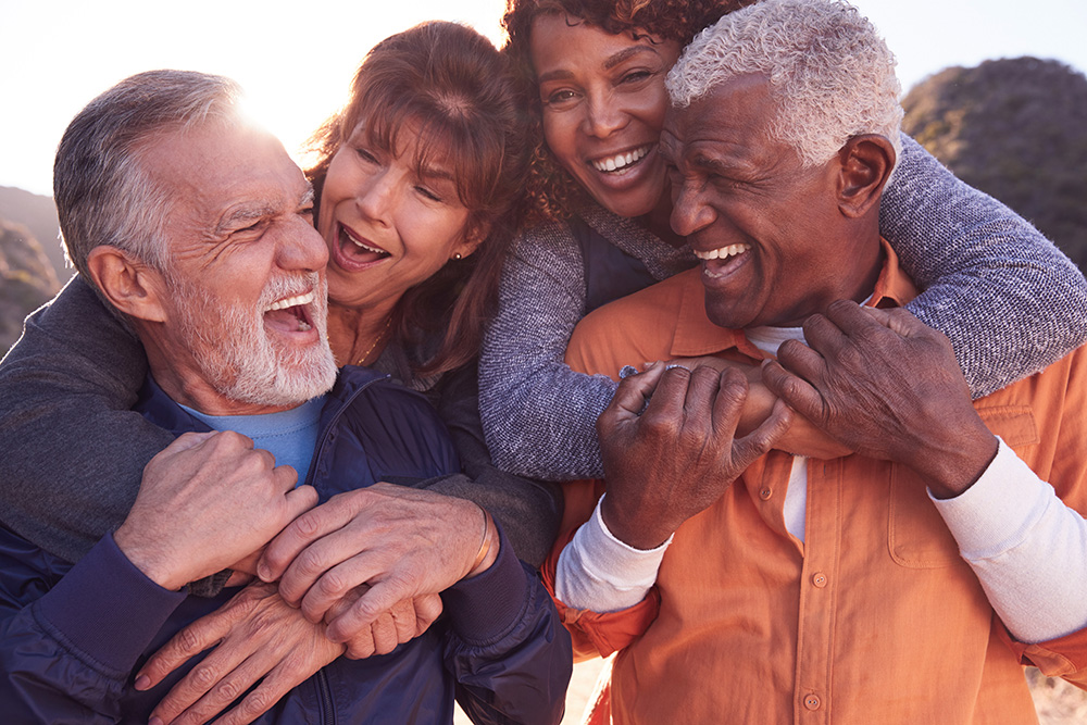 Group of adults smiling together